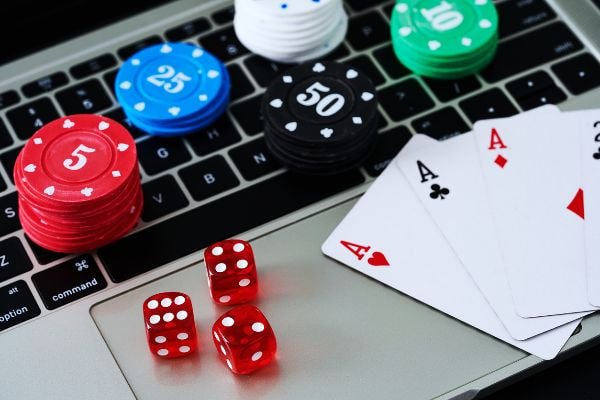 mahabet168 Mega Moolah baccarat dealer shuffling cards at professional live casino studio